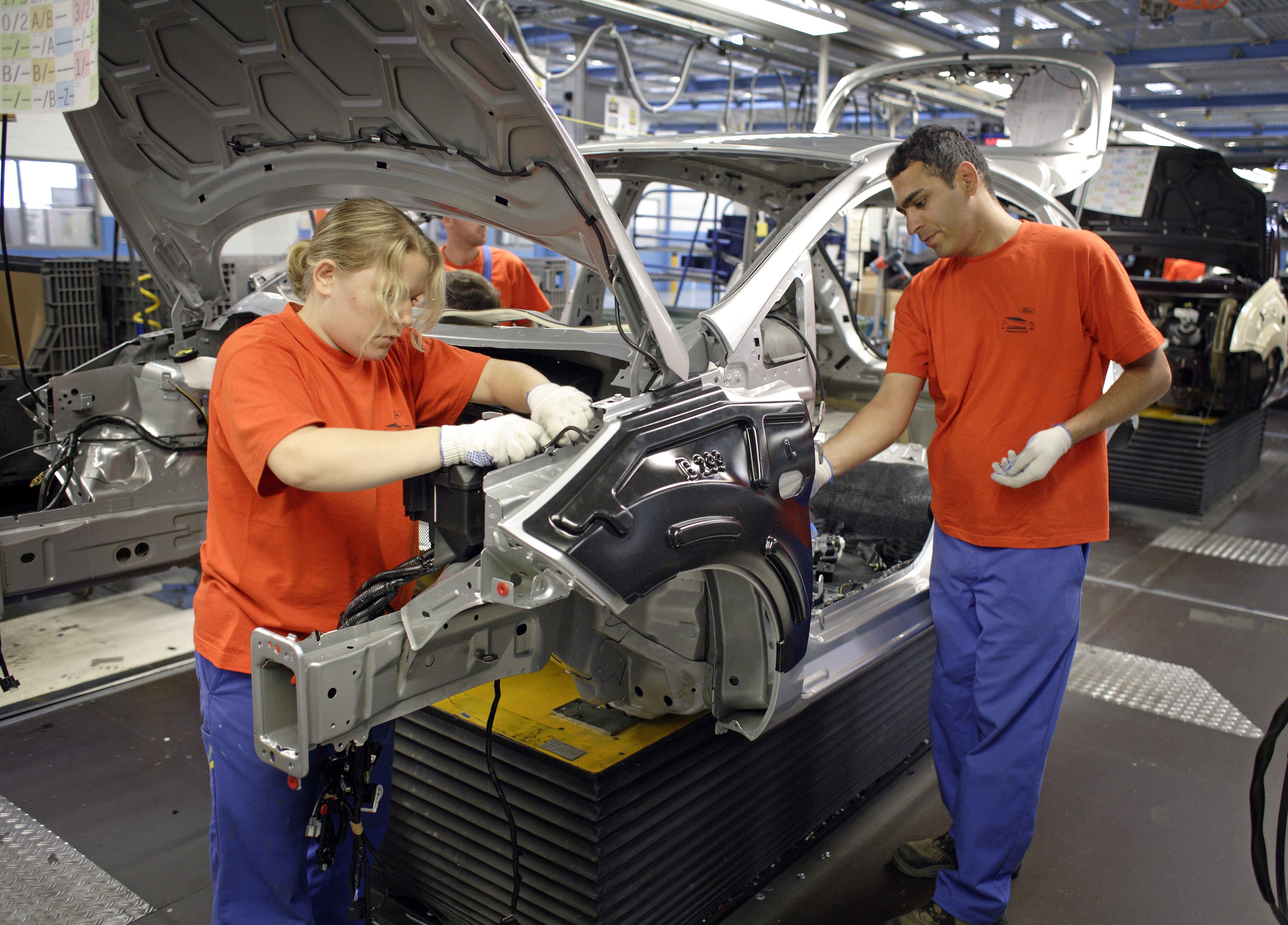 Autoproduktion bei Ford in Köln: Ohne Einwanderer müssten Unternehmen schon heute dicht machen.