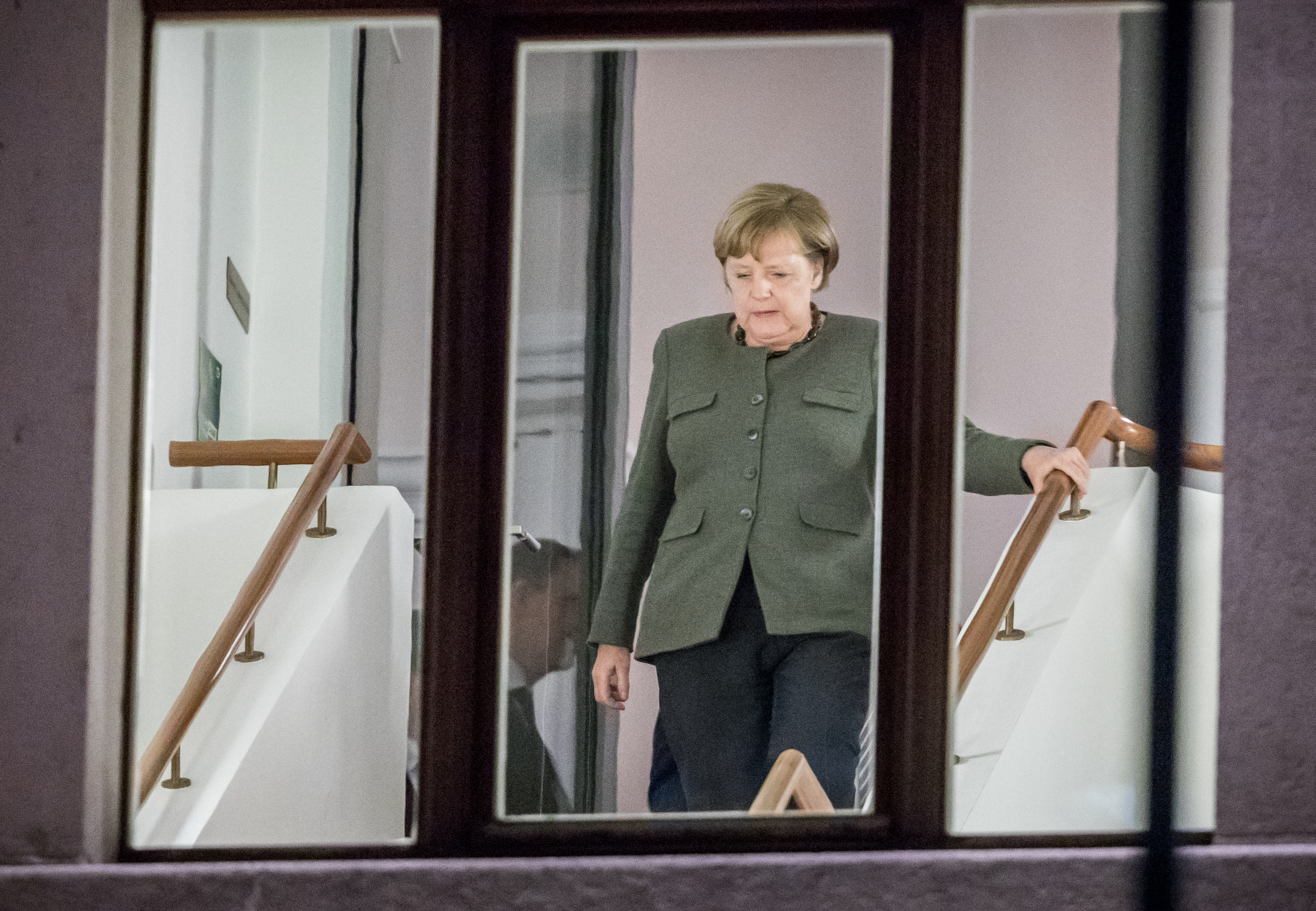 Angela Merkel bei den Sondierungsgesprächen von Union, FDP und Grünen in Berlin.